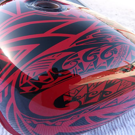 custom motorcycle paint job with Samoan tribal graphics