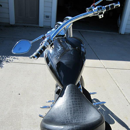 Custom painted chopper with airbrushed bulldog, lettering and flames