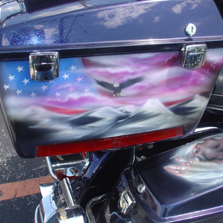 Custom painted harley bagger, ice pear with animal and people portraits, harley logo and flames