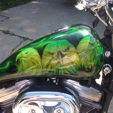 custom painted motorcycle gas tank with eagles and fire - kandy paint