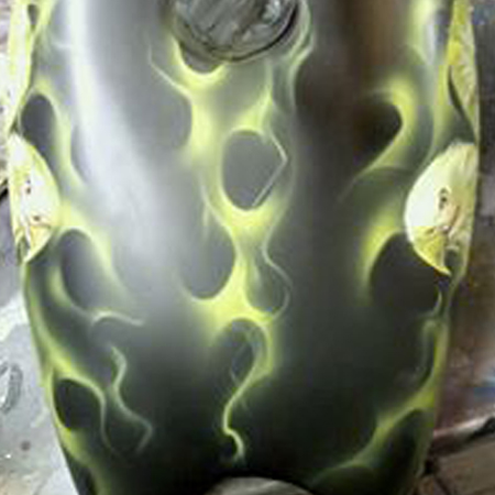 custom painted motorcycle gas tank with eagles and fire