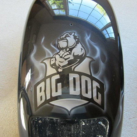 Custom painted chopper with airbrushed bulldog, lettering and flames