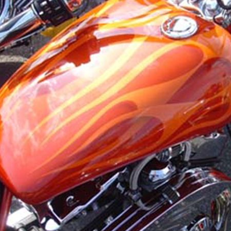 custom painted motorcycle with pearl flames