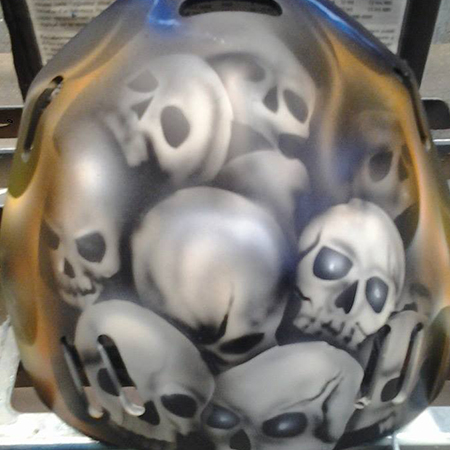 airbrushed skulls on goalie mask back plate