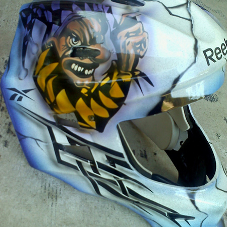 Evil jester custom painted on goalie mask